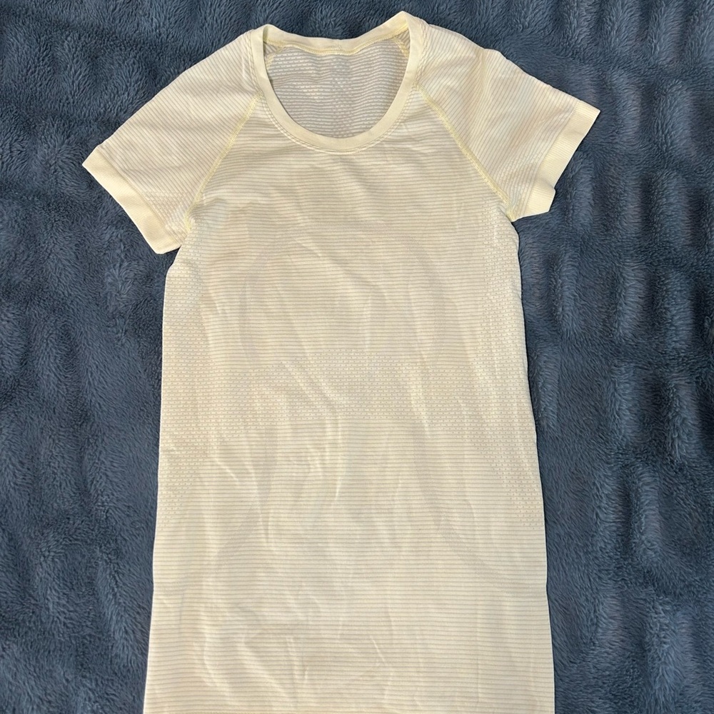 lululemon athletica light yellow Short Sleeve Top